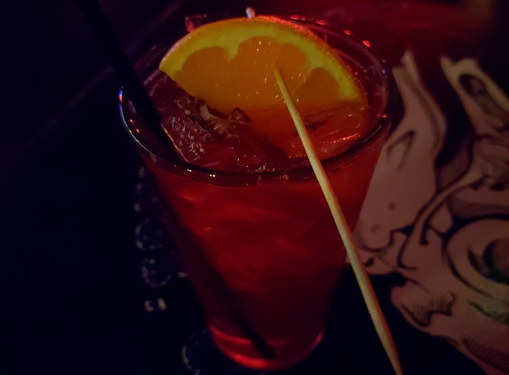 Fun red drink on a table.
